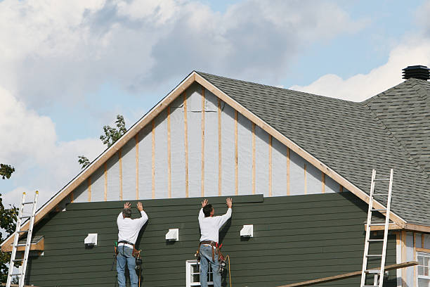 Professional Storm Damage Siding Repair technician working in Wyncote, PA